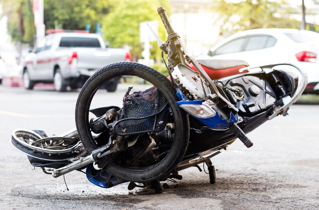 Motorcycle Demolished On The Road.